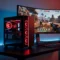 Valorant PC 2026 avec éclairage RGB rouge et blanc, écran incurvé 240Hz affichant un HUD Valorant, setup e-sport haute performance sur bureau noir minimaliste.
